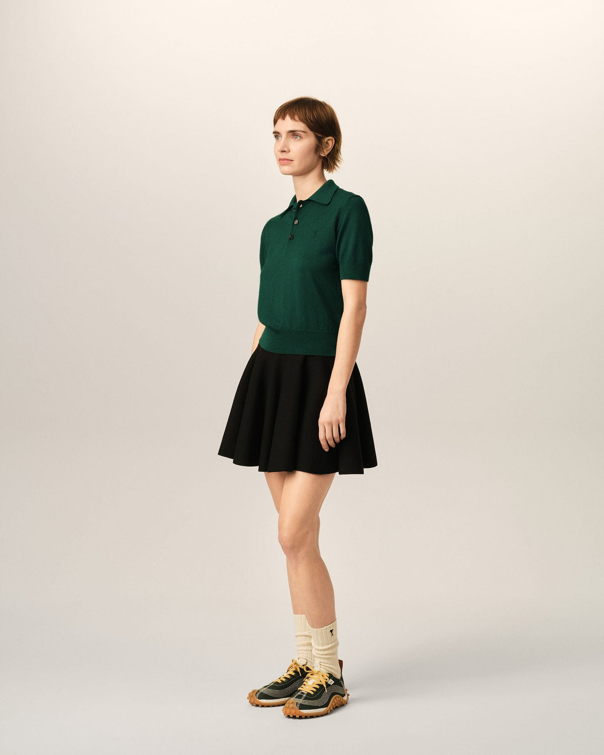 Green wool polo with Ami de Coeur
