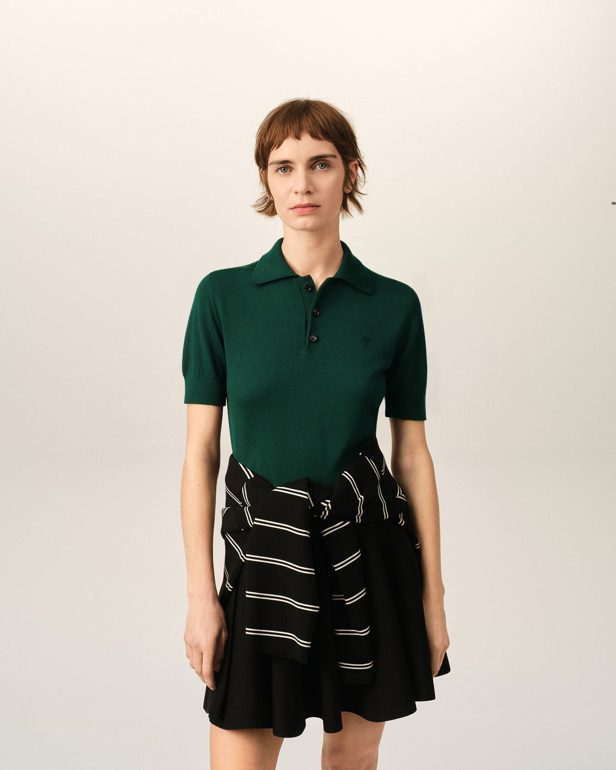 Green wool polo with Ami de Coeur