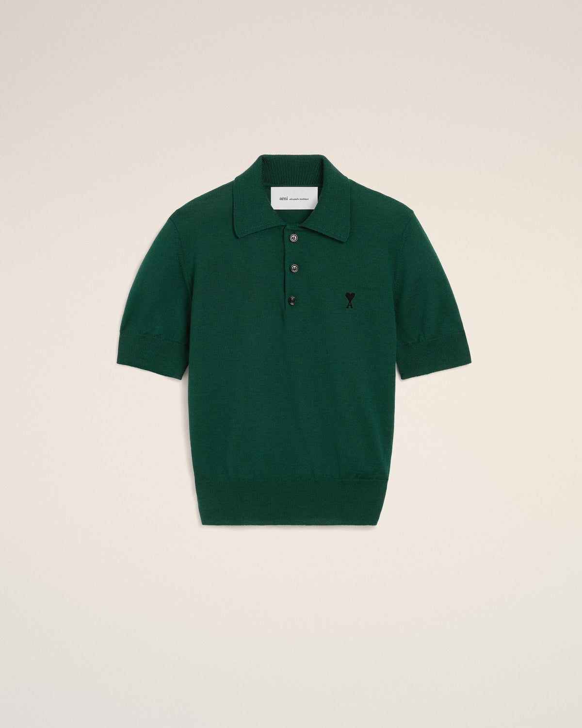 Green wool polo with Ami de Coeur