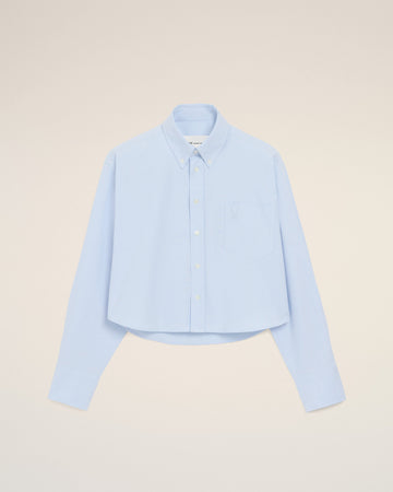 Blue cropped cotton shirt with embossed Ami de Coeur